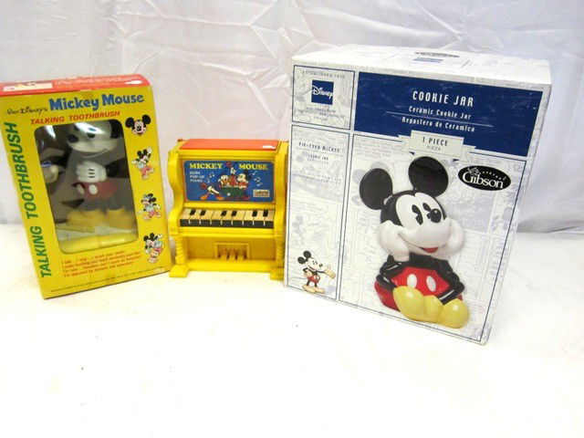 3pc Mickey Mouse Lot: Including talking toothbrush, lidded cookie jar and music pop up piano. All in good condition.