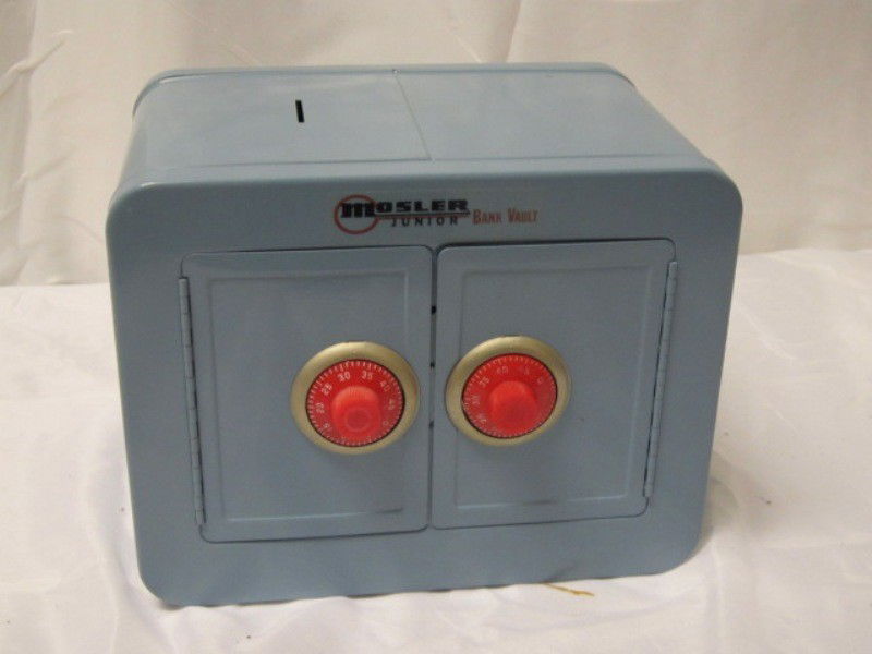Mosler Junior Alarm Sounding Combination Tin Bank: Vintage kids metal double combination dial Mosler bank vault with interior alarm with wrong combination is entered. Approx 9" x 7' x 6". Condition is very good with on missing rubber foot.