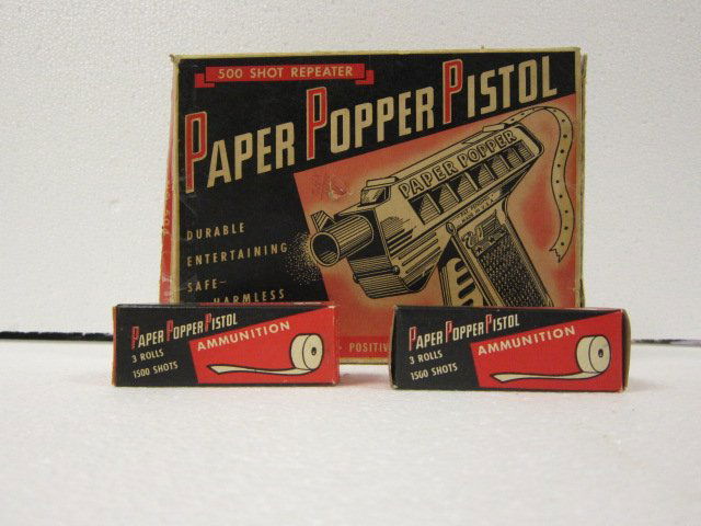 Meldon Paper Popper Pistol: Meldon Paper Popper Pistol w/ box and 2 boxes of ammo.
