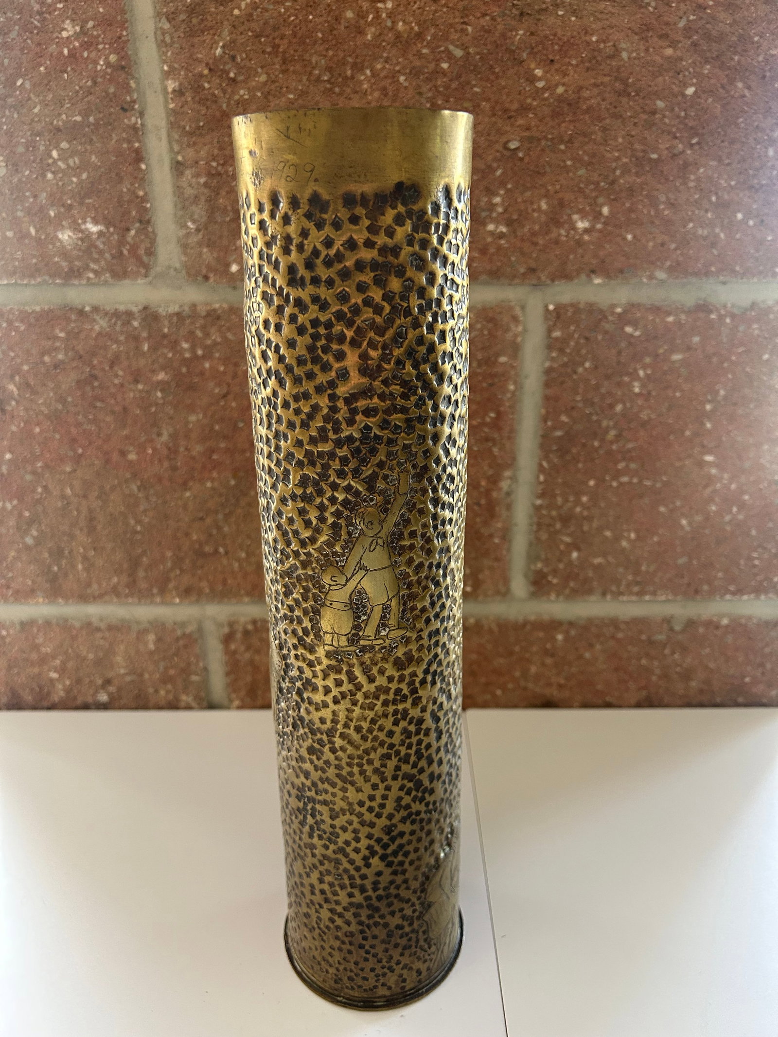 WW1 TRENCH ART VASE, HL, PORTRAIT SILHOUETTES: WW1 TRENCH ART VASE, HL INITIALED, 'SEPT 4 1928', POTRAITS, CARTOONS, FLORAL MOTIFS, TOP LEDGE HAS DAYTON OHIO OCT. 1929 ENSCRIBED, 14''TALL