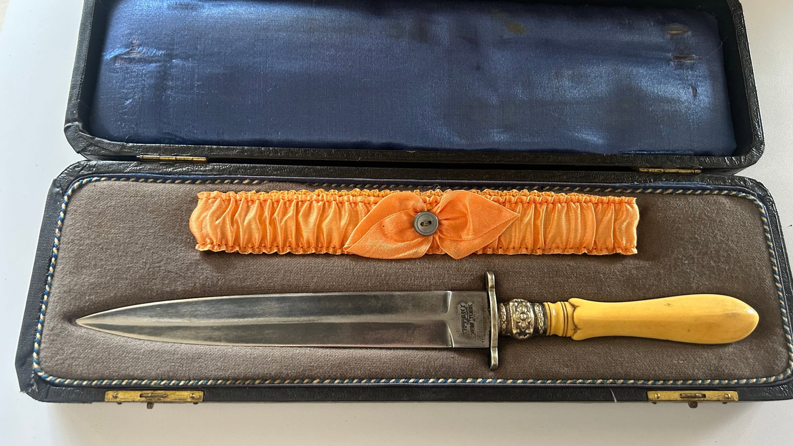 RARE TIFFANY & CO DAGGER IN FITTED CASE: RARE TIFFANY AND CO PRESENTATION DAGGER WITH ORANGE GARTER, MID 19TH CENTURY, ORIGINAL BOX MARKED TIFFANY AND CO NEW YORK 1-1-1898 EMILY, BONE OR IVORY HANDLE, 10 INCH LONG KNIFE
