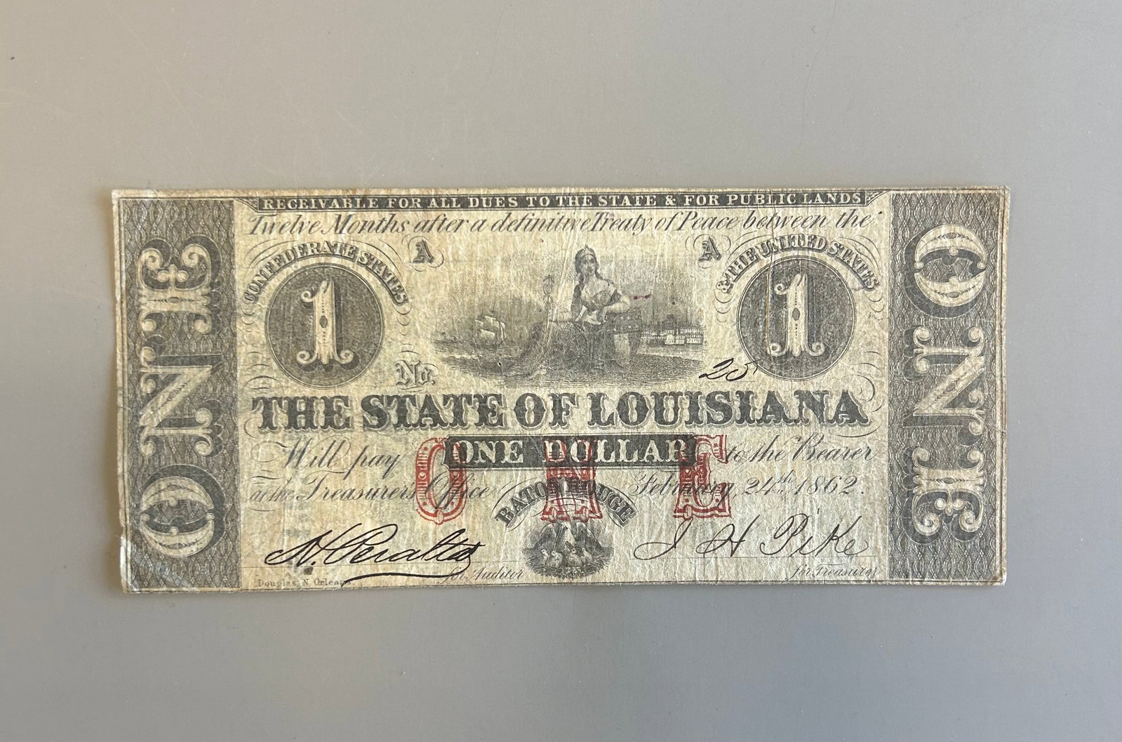 1862 CIVIL WAR ERA ONE DOLLAR BANKNOTE: 1862 CIVIL WAR ERA ONE DOLLAR BANKNOTE FROM THE STATE OF LOUISIANA.DATED FEBRUARY 24TH 1862PROVENANCE: ESTATE OF DOUG DIVISH NORTH EAST OHIO