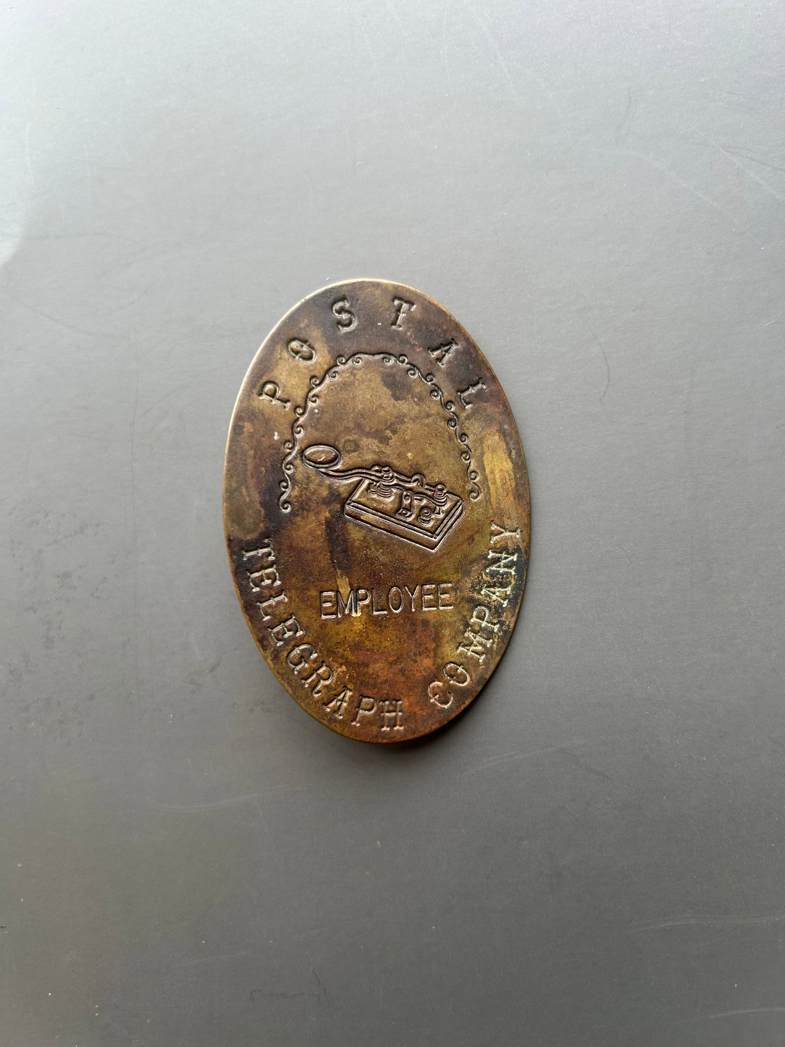 RARE POSTAL TELEGRAPH CO. EMPLOYEE BADGE (1 of 2)