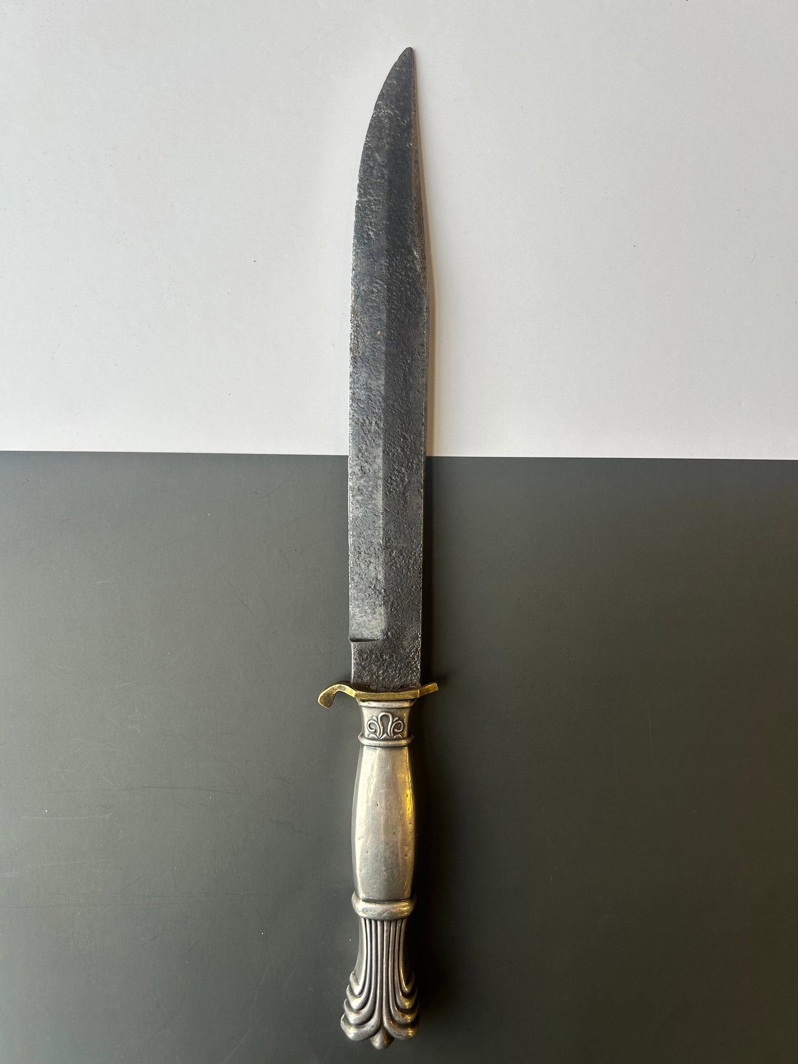STERLING HANDLED BOWIE KNIFE: STERLING HANDLED DAGGER, MARKED STERLING, NO MAKERS MARKS, ORNATE HANDLE, 13''LONG, PROVENANCE: ESTATE OF DOUG DIVISH, NORTHEAST OHIO