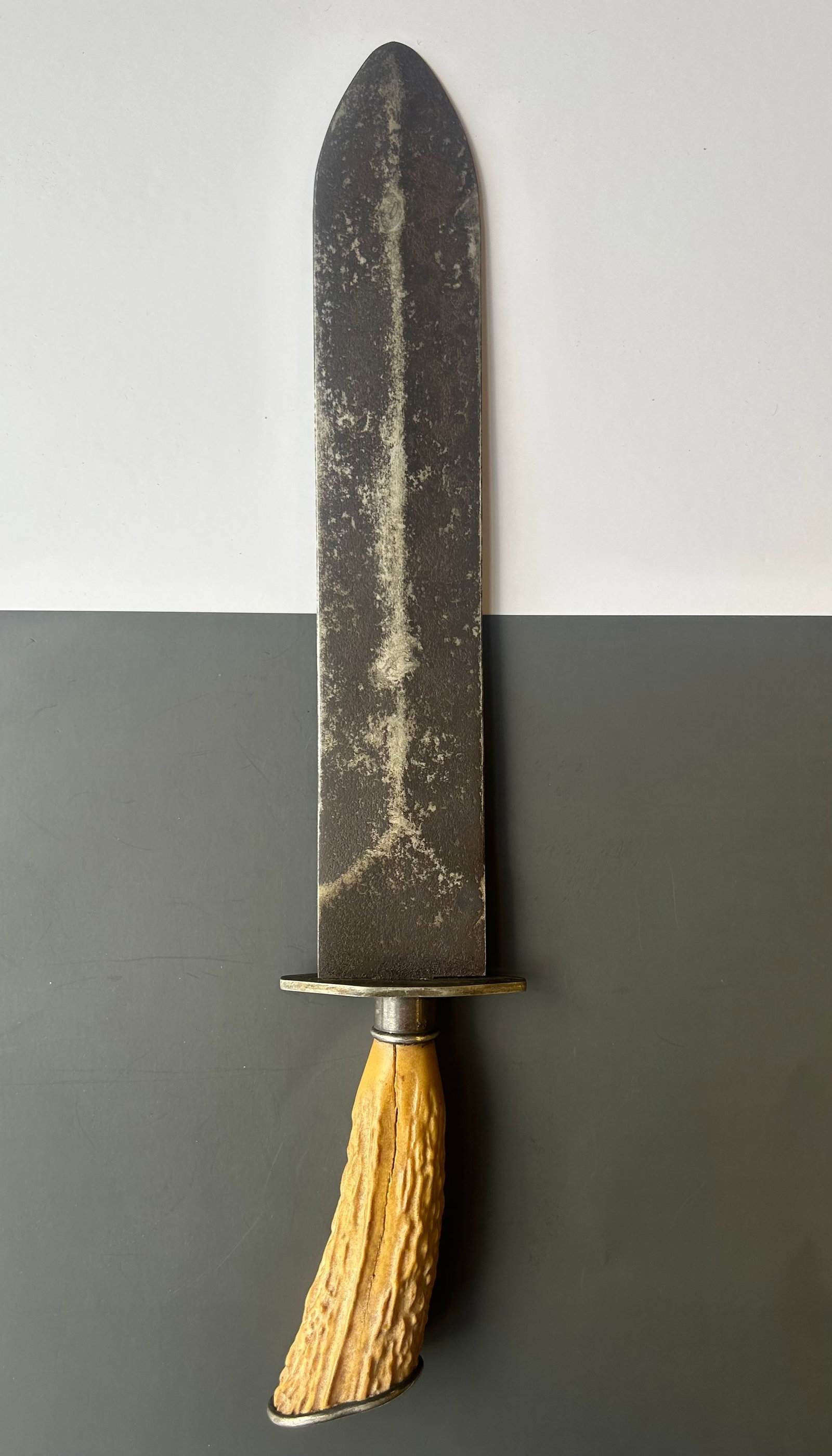 IXL GEORGE WOSTENHOLM & SON LARGE SIDE KNIFE: IXL GEORGE WOSTENHOLM & SON LARGE SIDE KNIFE, WASHINGTON WORKS SHEFFIELD, MARKED STERLING ON HILT, H27, ANTLER HANDLE. 17''LONG, INITIAL 'C' ENGRAVED ON ENDPROVENANCE: ESTATE OF DOUG DIVISH, NORTHEAST