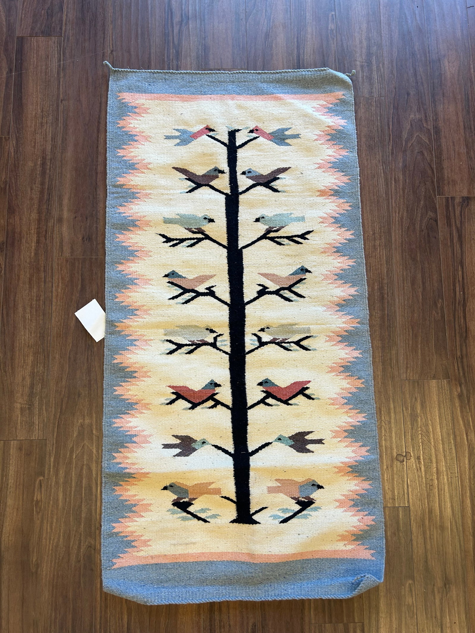 SOUTHWESTERN HANDWOVEN TREE OF LIFE PICTORIAL RUG: BEAUTIFUL HANDWOVEN WOOL SOUTHWESTERN PICTORIAL RUG FEATURING THE CLASSIC TREE OF LIFE MOTIF POPULATED WITH COLORFUL BIRDS PERCHED AMONG BRANCHING LIMBS. THE RUG MEASURES APPROX. 60" X 30". GOOD