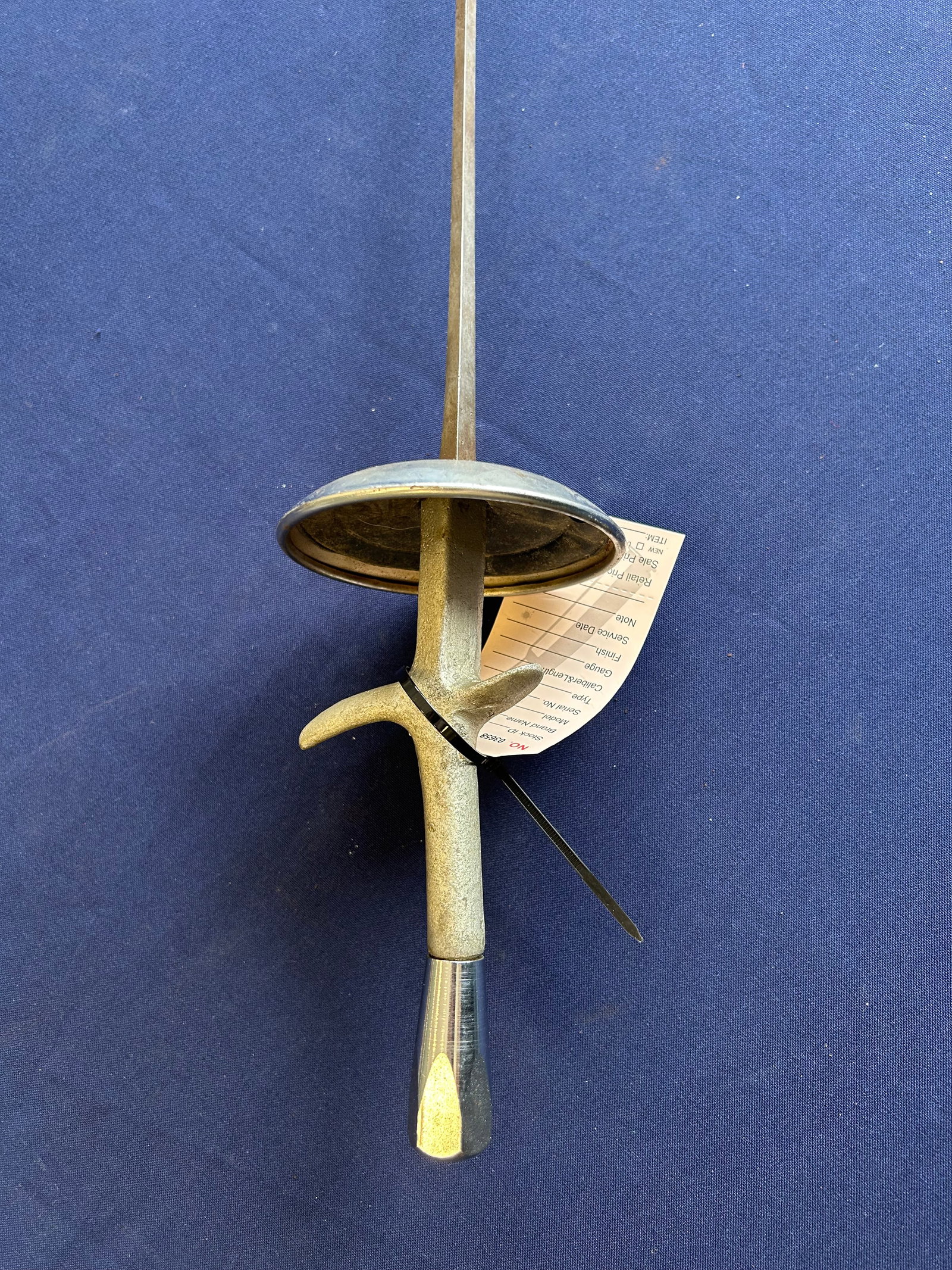 VINTAGE ITALIAN STYLE FENCING FOIL SWORD: CLASSIC FULL SIZE FENCING FOIL FEATURING A 35.5 INCH FLEXIBLE STEEL BLADE, BROAD BELL GUARD, METAL GRIP, AND HOOKED QUILLON. THE BLADE HAS FAINT STAMPED MARKINGS, UNABLE TO MAKE OUT. SHOWS SURFACE OXI