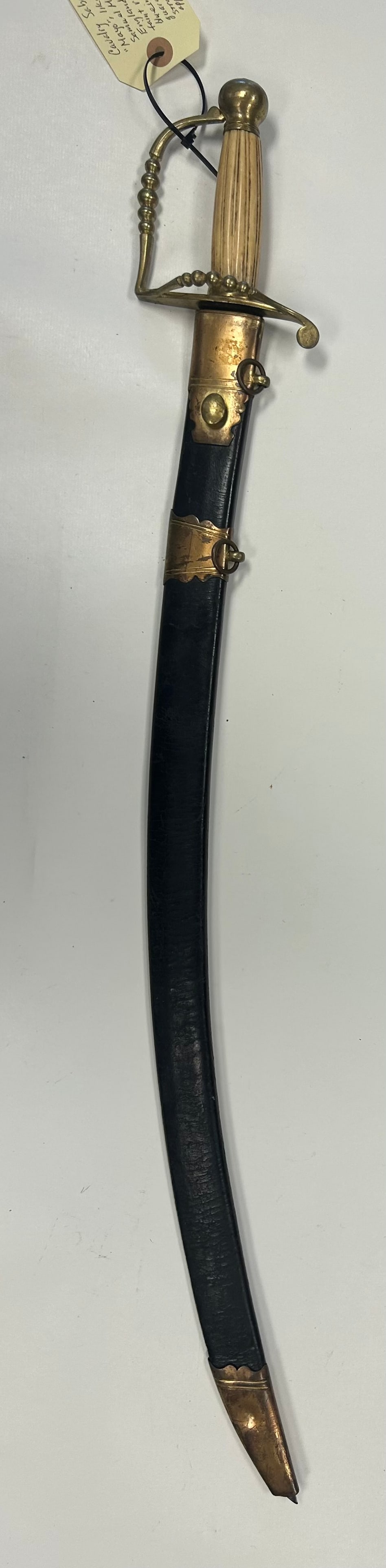 EARLY 19th CENTURY MAYO NAVAL OFFICER'S SABER: FINE EARLY 19th CENTURY NAVAL OFFICER'S SABER WITH APPROX. 29?" CURVED BLADE STAMPED MAYO, FIVE BALL BRASS GUARD, FLUTED GRIP AND DECORAIVE BLADE ETCHING WITH TRACES OF GILT. COMPLETE WITH BLACE LEATH