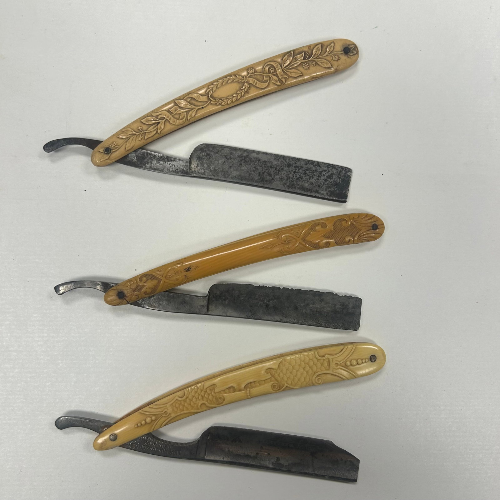 THREE ANTIQUE STRAIGHT RAZORS WITH ORNATE HANDLES (1 of 2)