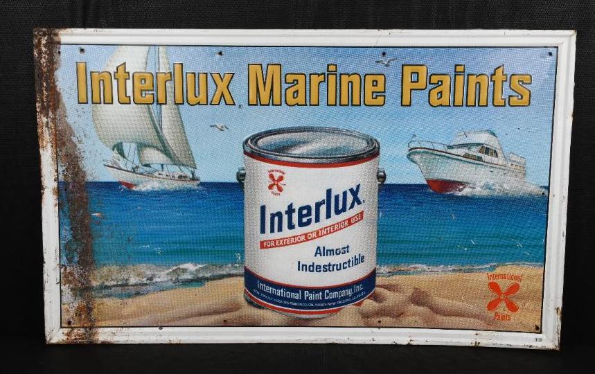 Interlux Marine Paints w/Ships Metal Sign: SST embossed sign has good color and shine, has wear in the field, rust and paint loss along the left-hand edge, 28.75"x46.5", rated 7.25. TAC #016720
