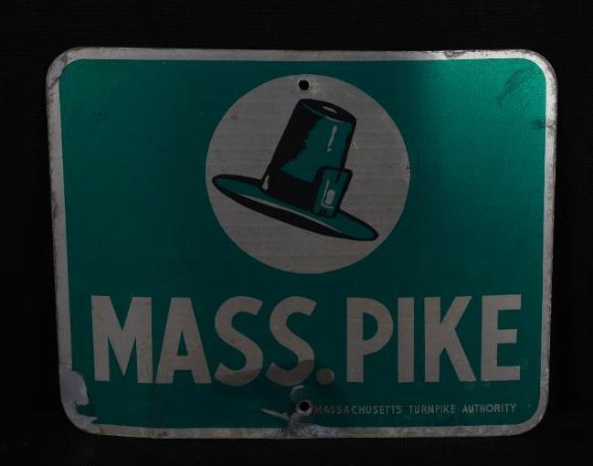 Mass. Pike w/Pilgrim Hat Logo Metal Sign: SST reflective finish sign, has light wear and decal damage along the bottom edge, marked Massachusetts Turnpike Authority, 16"x20", rated 7.25. TAC #008067