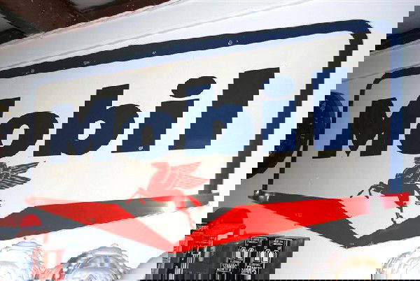 Mobil with small Pegasus logo, DSP guillotine shap: Mobil with small Pegasus logo, DSP guillotine shape sign, 52x96 inches,