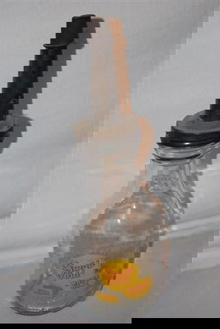 Liquid Gold Motor Oil one quart glass bottle with: Liquid Gold Motor Oil one quart glass bottle with metal spout,