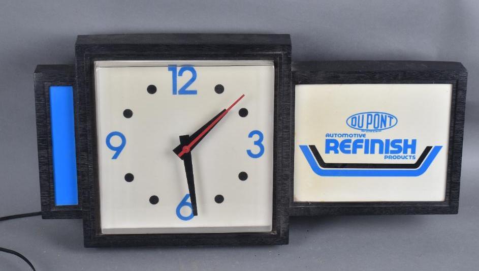 Dupont Automotive Refinish Products Plastic Lighted: rated 9, 12"x24"x6", the plastic molded clock lights up and clock works, in good condition.