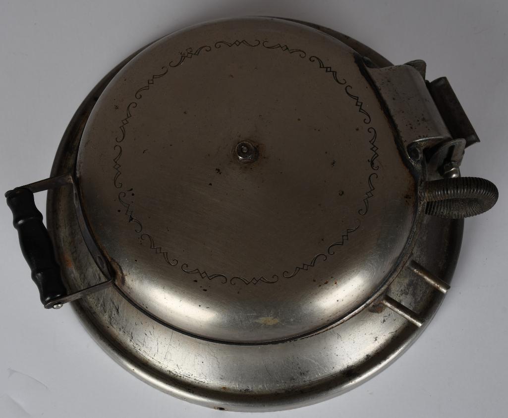 Coca-Cola Electric Waffle Style Iron: rated 8, 8"D., the metal waffle iron style appliance is in good condition, has wear, we do not have the cord