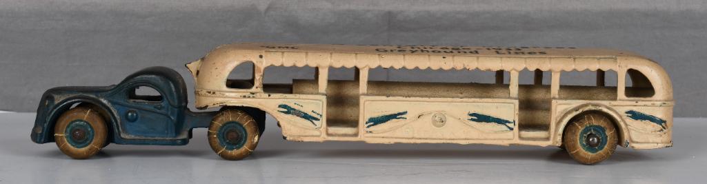 Arcade GMC "A Century of Progress Chicago 1933: rated 7.75, 10"L., the bus has a nice patina look has little wear and dust staining, tires are weather-cracked but together.