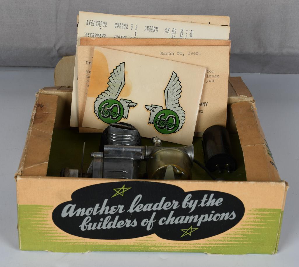 Ohlsson "60" Custom Motor w/Box: rated 8, 5"L., the motor is complete, is struck, I can not turn it, comes with insert and other parts, also comes with original decals and paper work. The box is complete has wear and soiling.