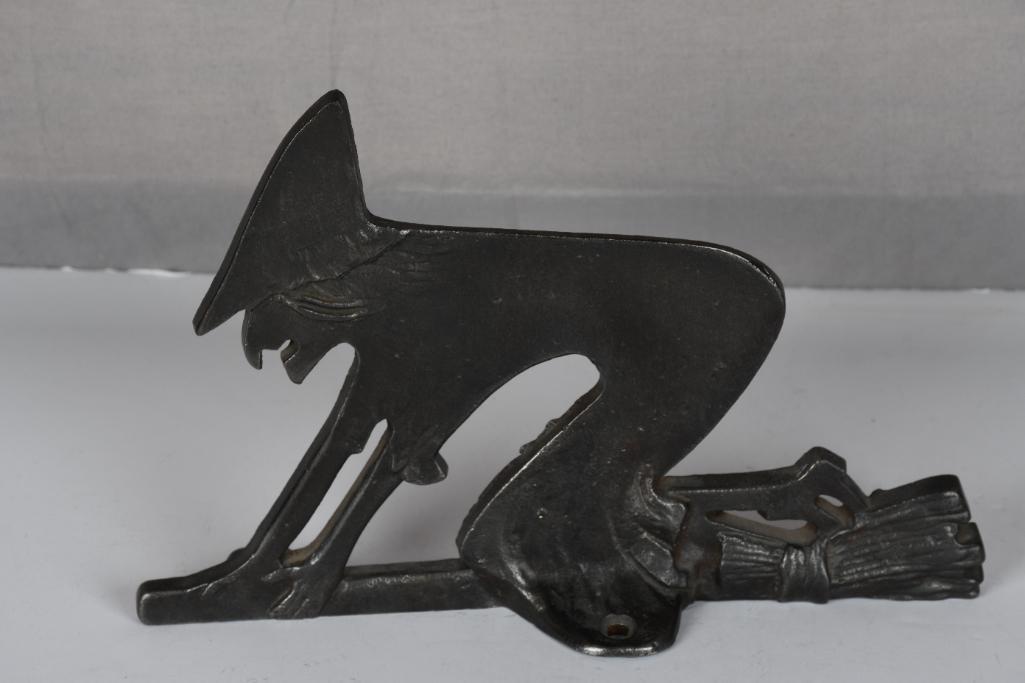 Cast Iron Witch on Boom Door Stop: rated 9+, 7"x10", cast iron door stop is in very good condition, no breaks.