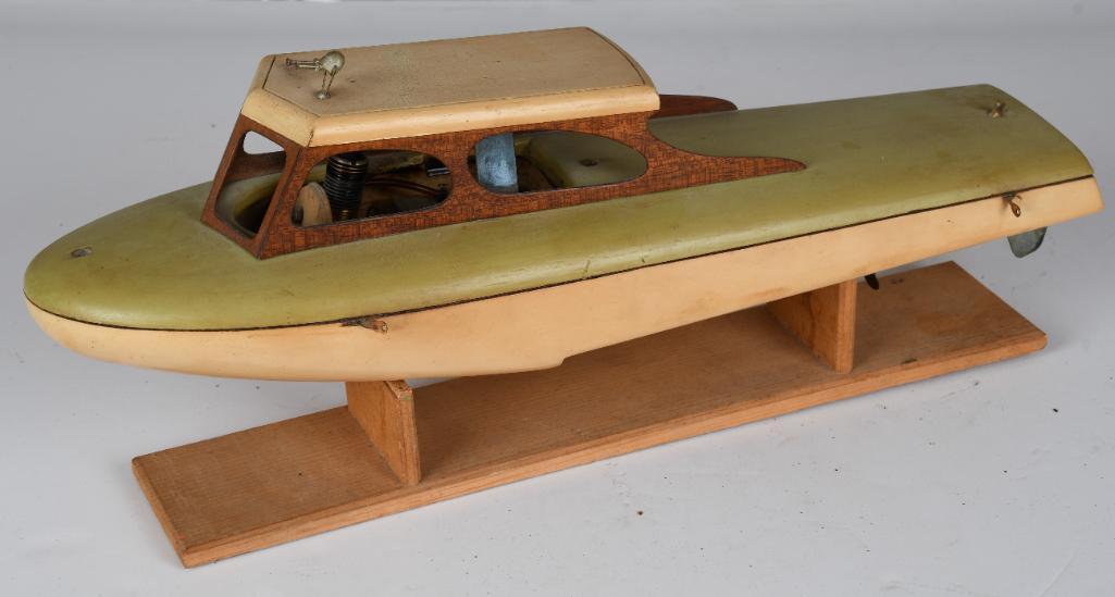 Gas Engine Power Woody Body Toy Boat: rated 8, 17"L., the balsa wood body is in good condition, has light wear and scuffs, gas engine is stuck.