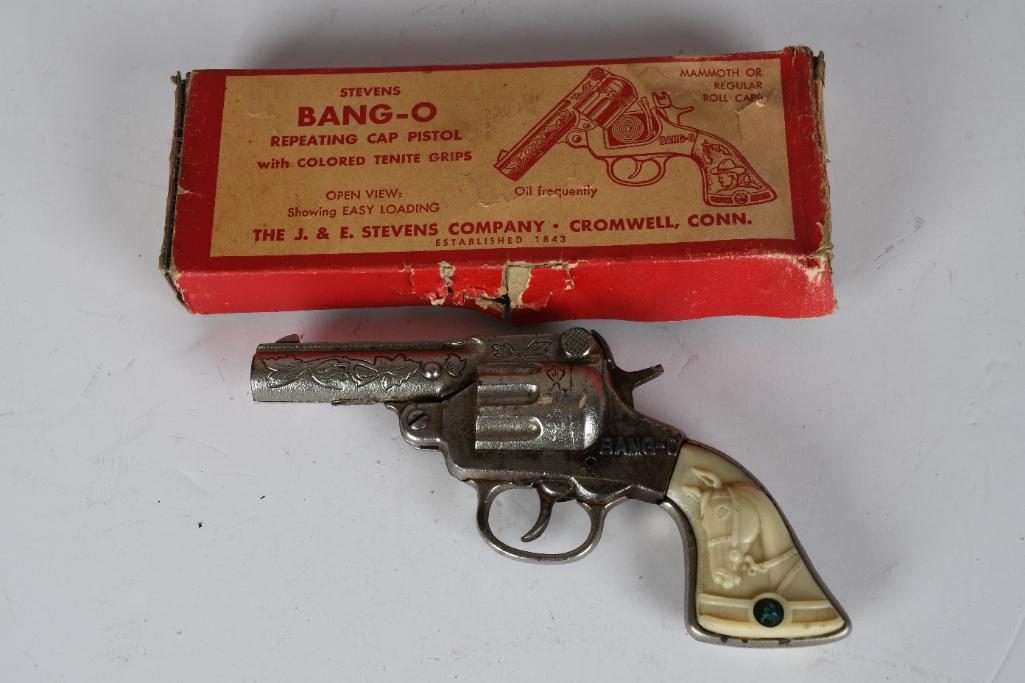 J.&E. Stevens "Bang-O" Cast Iron Toy Cap Gun w/box: rated 8, 7.5"L., in good condition, has light tarishing, box has tears and creases.