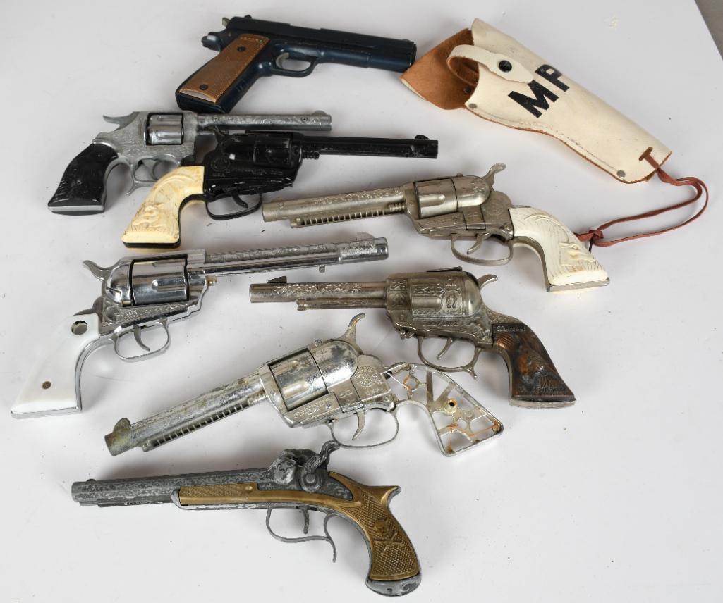 Box lot of Diecast & Plastic Toy Cap Guns: rated 6 to 8, 10"L. or less in size, all different condition.