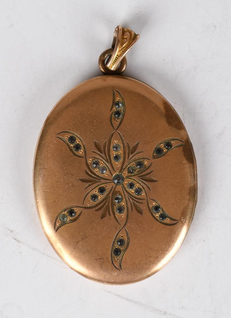 Locket w/ stones on front: Large locket is marked AAG on the inside. Gold filled? Has some wear.Ã‚
