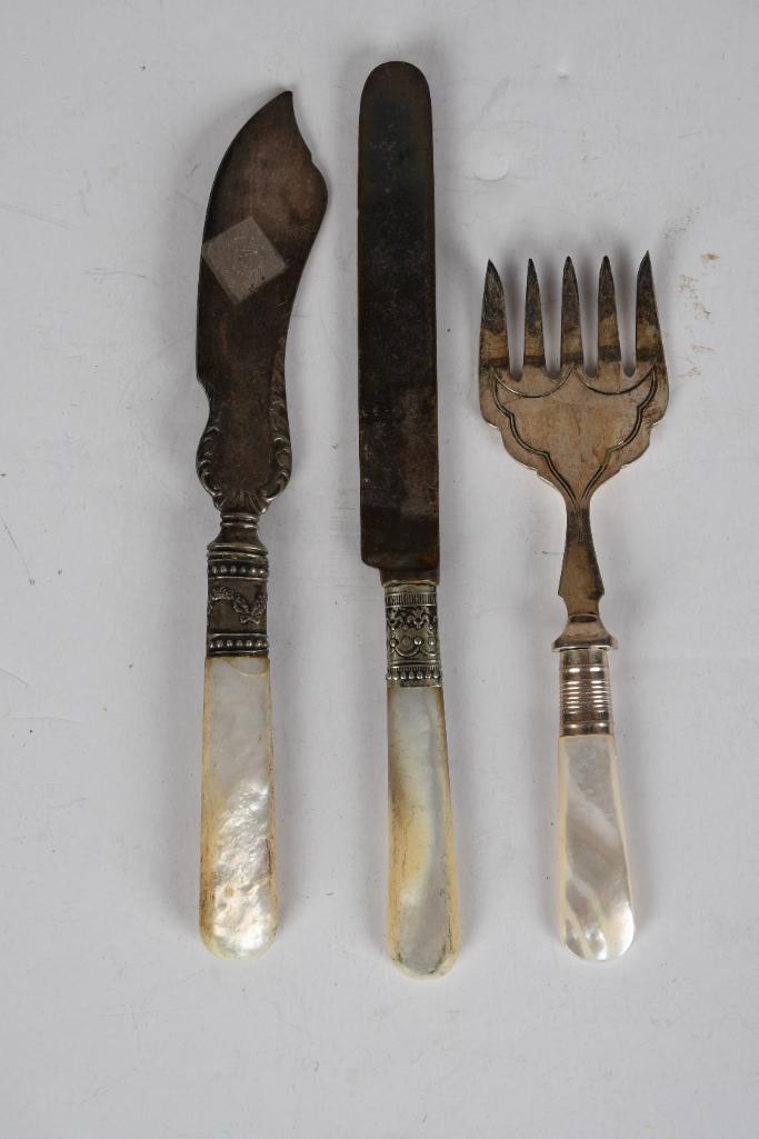 lot of 3- Sterling Silverware MOP: Mother of Pearl handle with sterling fork and 2 different knives. All in good condition. Measure 7"L or smaller.