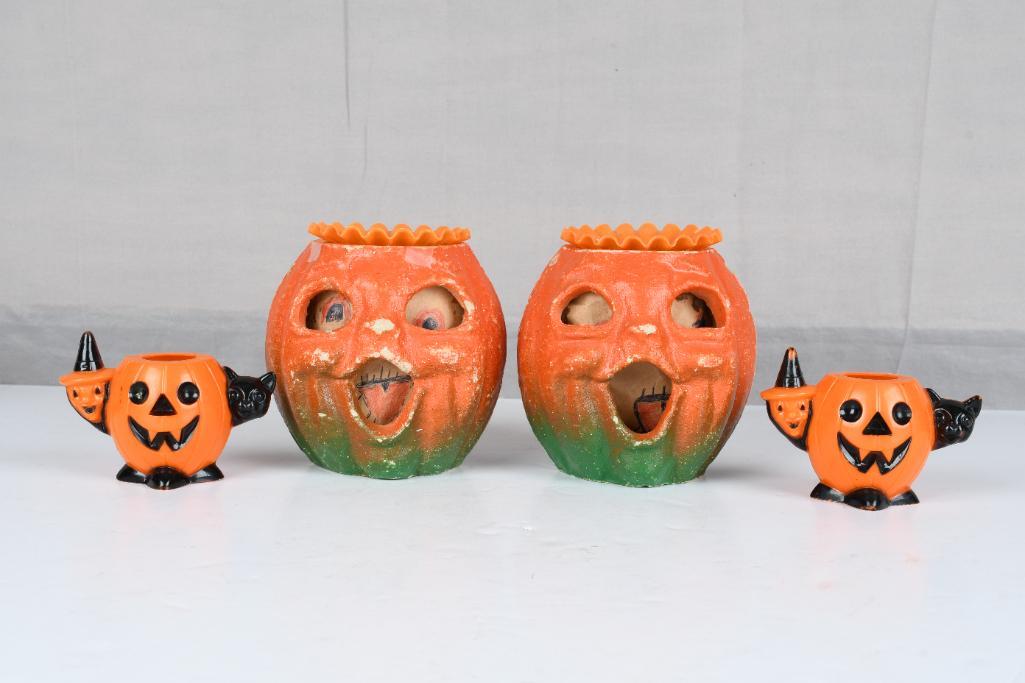 Lot of 4- Halloween Decorations: 2 paper macheÃ‚ pumpkin decorations. 2 plastic pumpkins with black cat and witch on each side. All in good condition. Measures 5"x5" or smaller.
