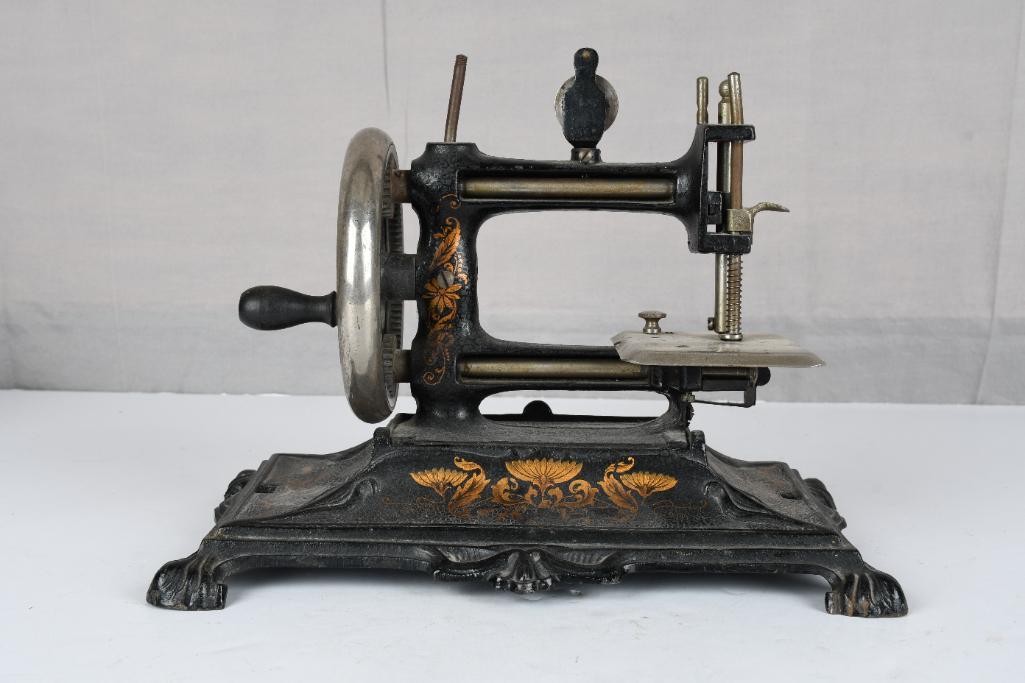 Small Ornate Cast Iron Hand Operated Sewing Machine (1 of 4)