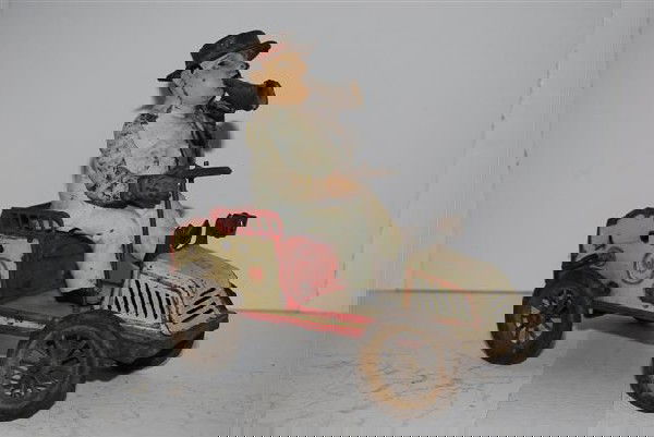 Lehmann "Tut Tut" man in car with horn, tin clock: Lehmann "Tut Tut" man in car with horn, tin clock work, 6.75 inches long,