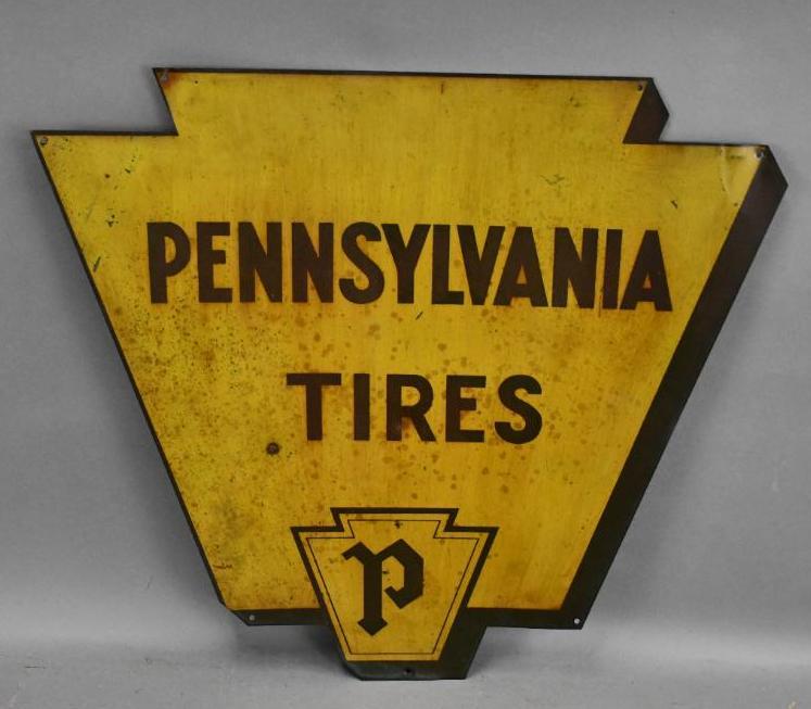 Pennsylvania Tires w/Logo Metal Sign: Rated 6.75, 22"x25", SST keystone-shaped sign has wear and spots.