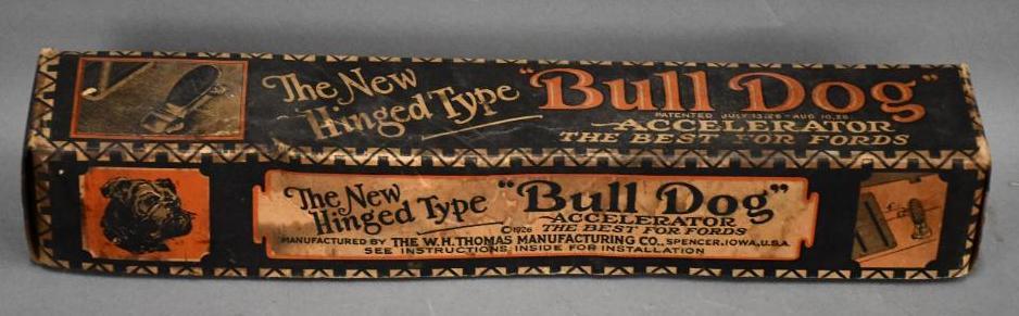 The New Bull Dog Accelerator for Fords: Rated 7, 16"L., has product in the box.