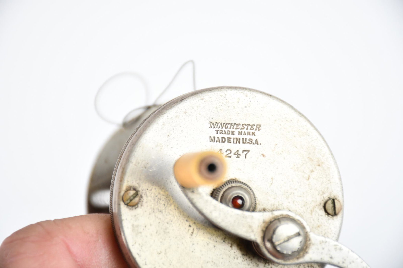 Winchester Fishing Reel #4247: rated 8, in good condition, works well.