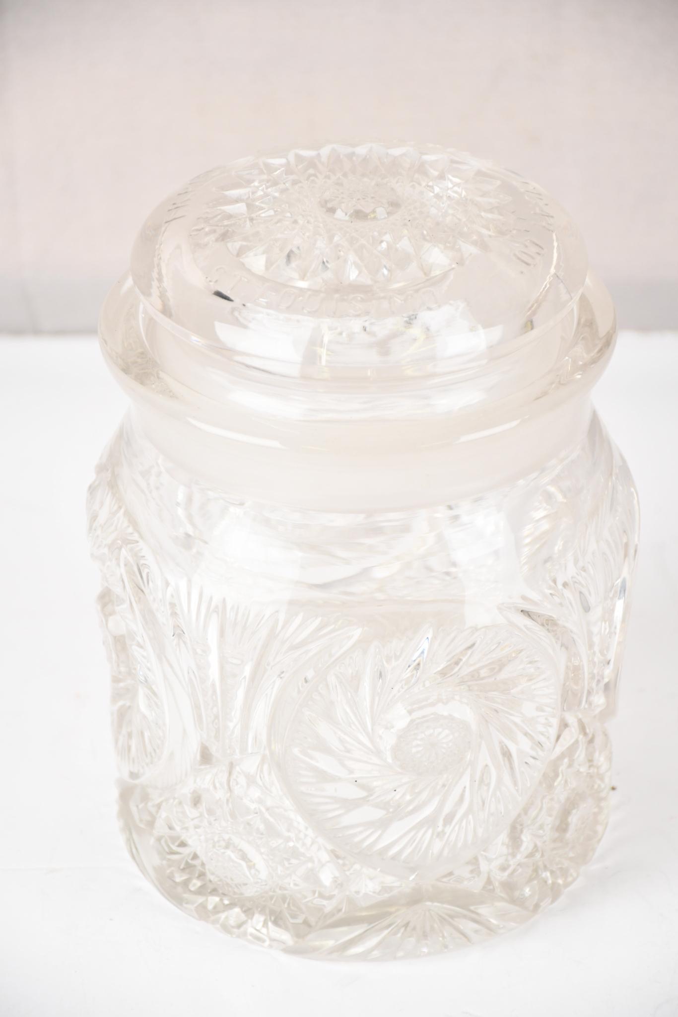 Mercantile Cigar Co St. Louis Press Glass Cigar Humidor: rated 9, 8"H., the press glass humidor is in very good condition.