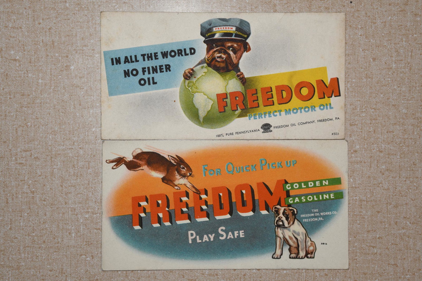 Lot of 2- Freedom Oil Company Ink Blotters: Two Freedom Oil Co. 100% Pure Pennsylvania ink blotters. Both have great graphics and are in good condition. Both measure 6"L x 3"H.