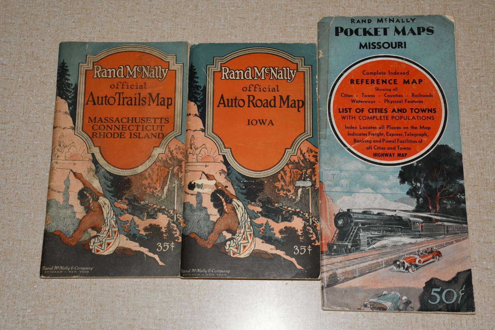 3-Rand McNally Road Maps Iowa, New England and Missouri: rated 7, 9"x4.5", all have good color, all have wear and soiling.