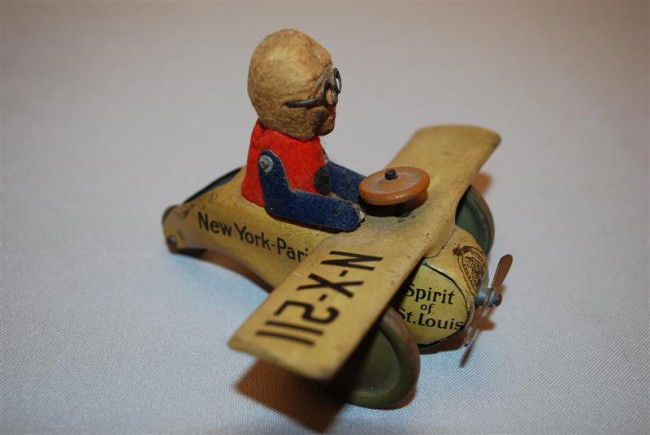 Schuco "Spirit of St. Louis" tin litho friction ai: Schuco "Spirit of St. Louis" tin litho friction airplane, 4.5 inch wing spam,