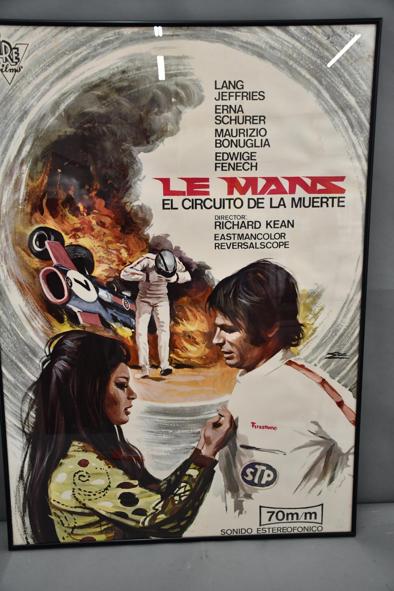 Le Mans Movie Poster: rated 8, 39"x28", paper poster has good color, has been folded, is framed under plexiglass