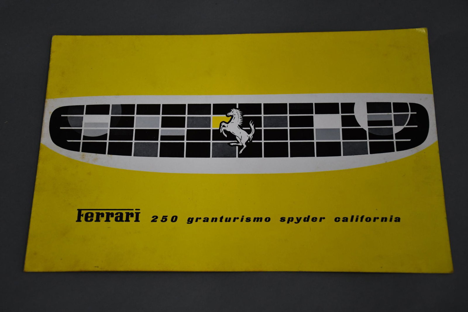 Ferrari 250 Granturismo Spyder California Sales Literature: rated 8.25, 7"x11", has good color, folds open to black & white images of the car and motor, light wear