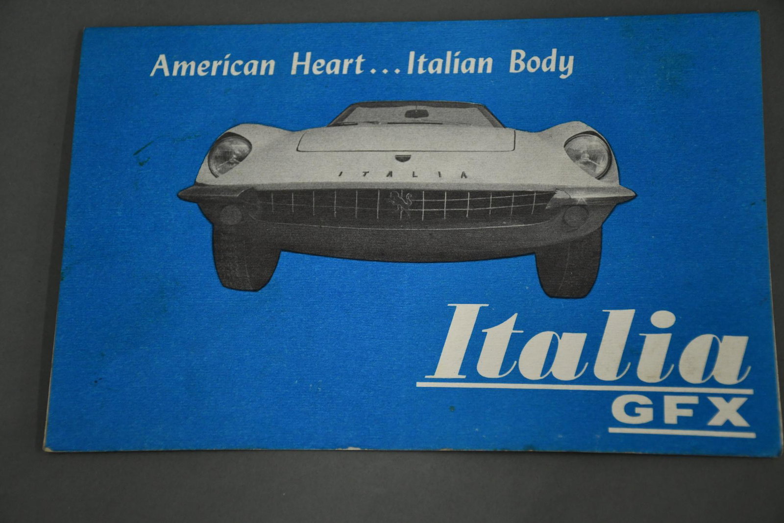 Italia GFX Sale Literature: rated 9, 5.5"x8.5", flips up to show car in, gives the specs, nice