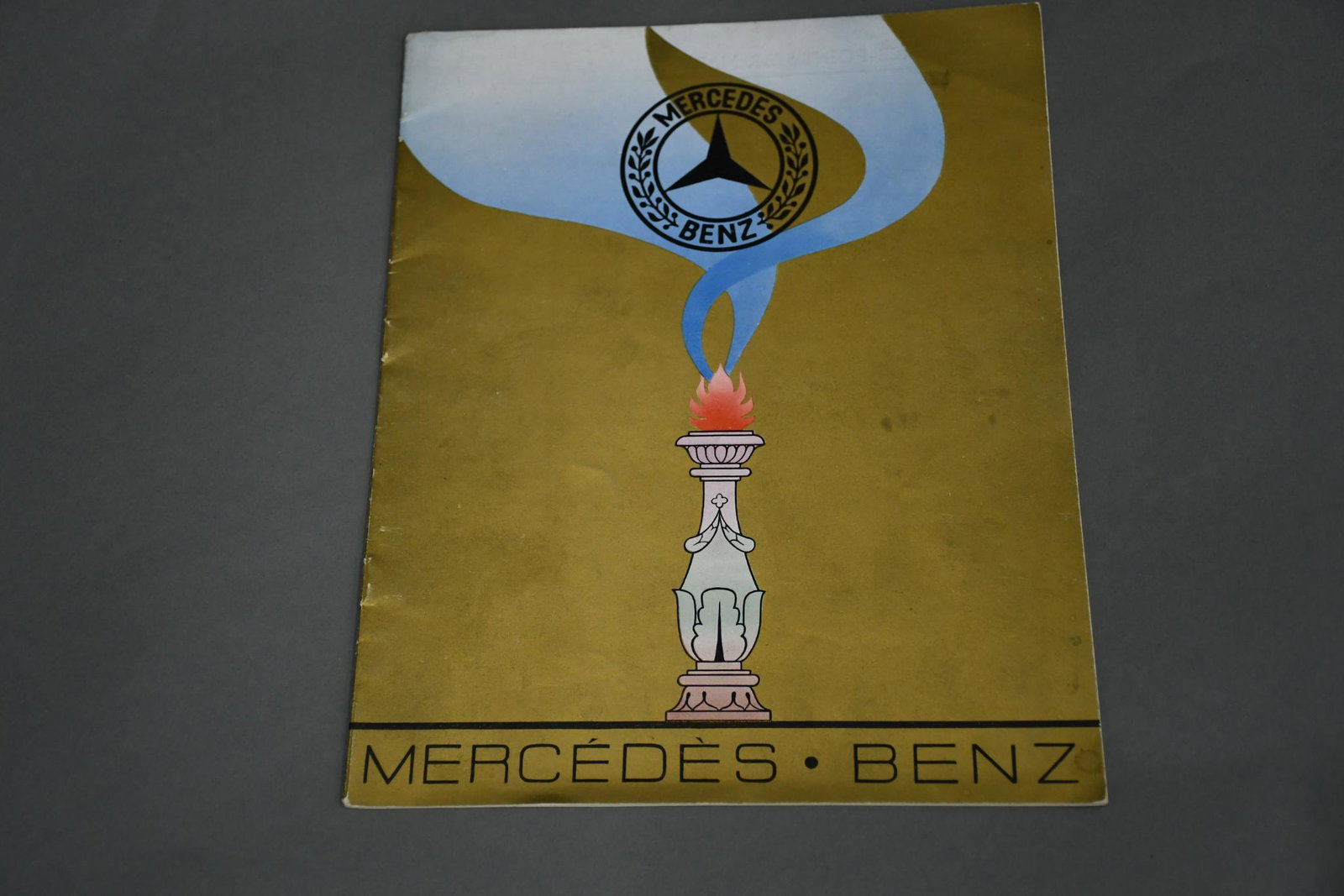 1927 Mercedes Benz Sales Literature: rated 8, 10"x8", 7 pages, has good color, cover has light soiling, inside is in good condition, has both color and black & white images.
