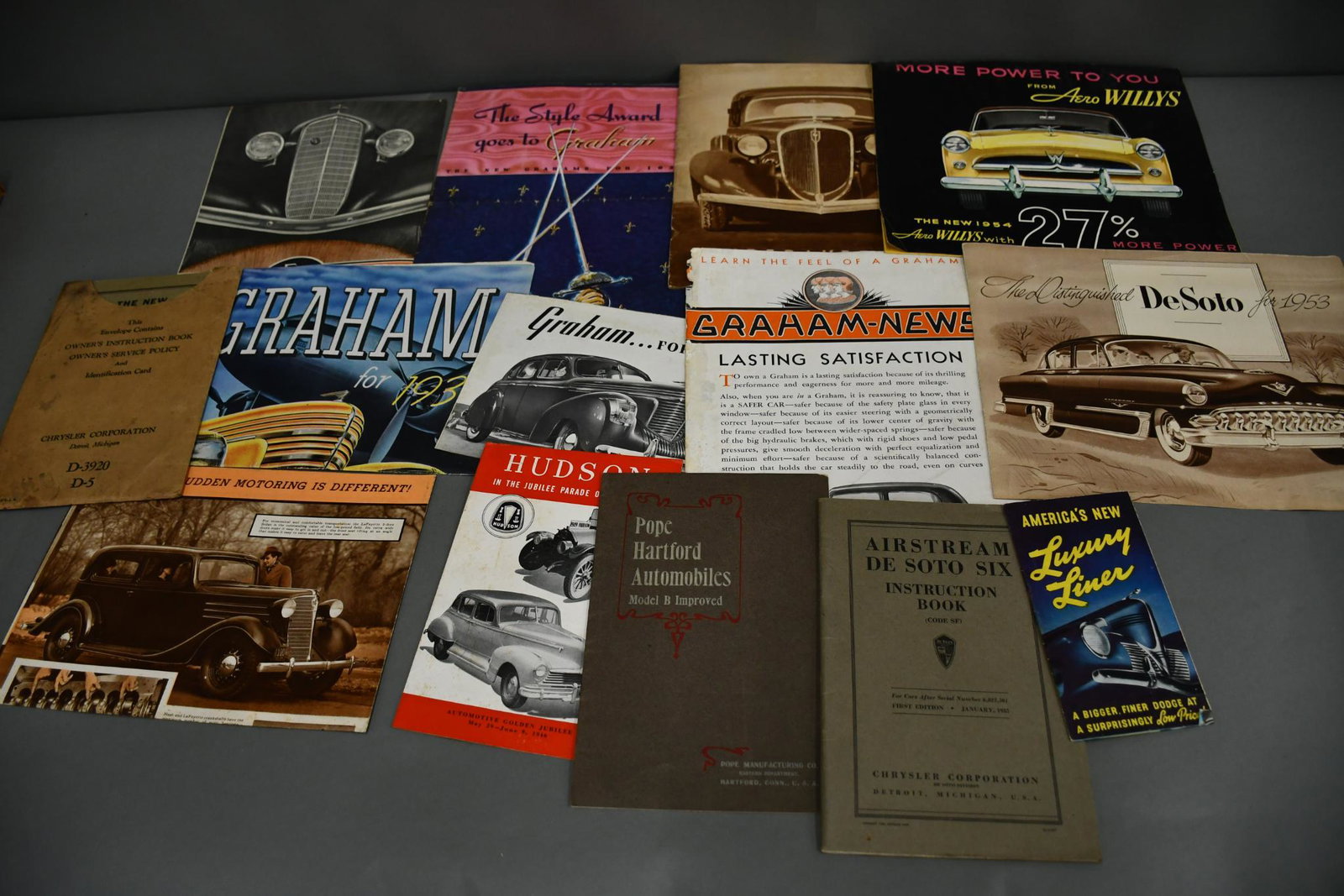 Box Lot of Different Car Co. Sales Literature: rated 7 to 8, different condition, see photos, Pope, Hudson, De Soto, Grahman and more