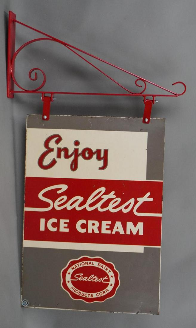 Enjoy Sealtest Ice Cream w/Logo Metal Sign (TAC): rated 7.5, 27.5"x19.5", DST sign has good color, has wear and fine scratches, marked Stout. TAC #040500