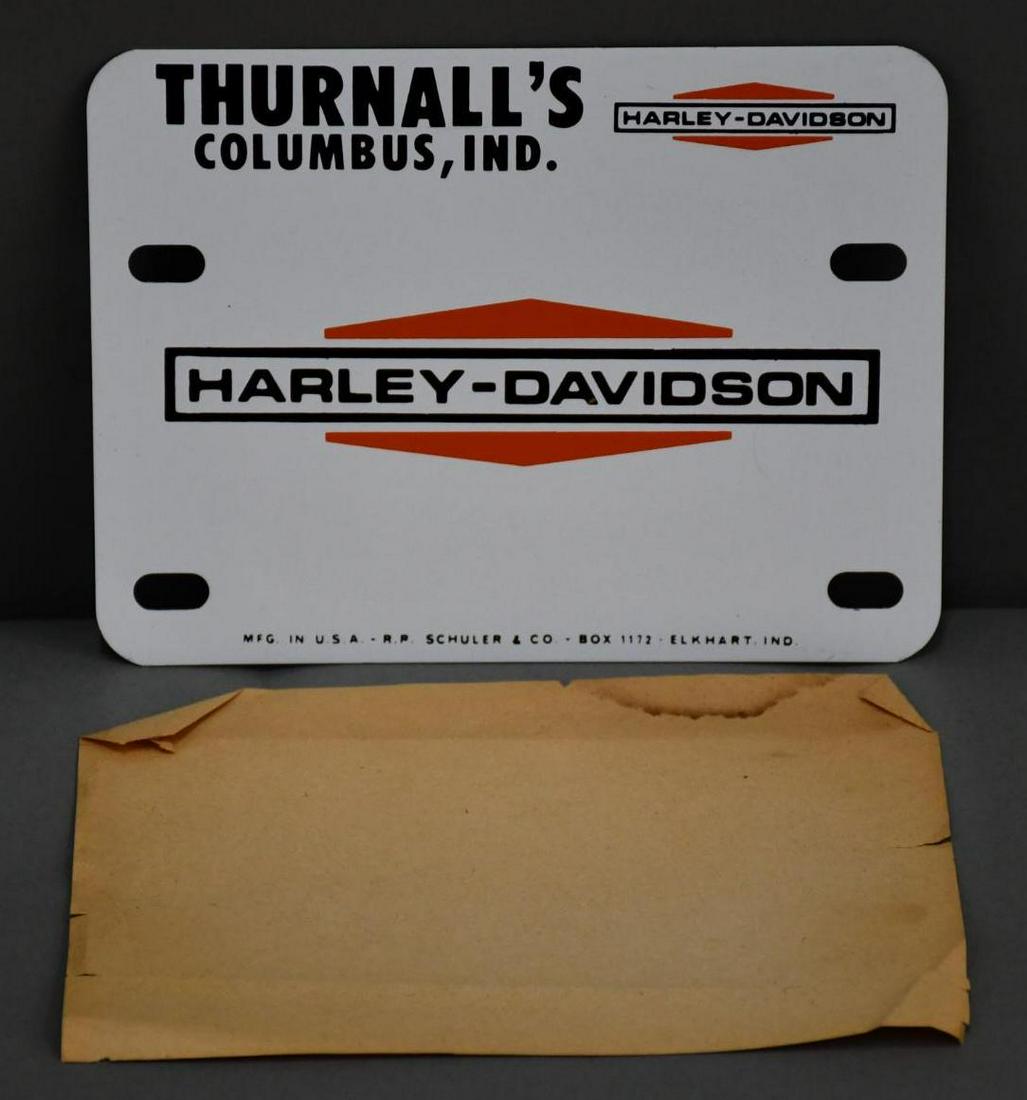 1960's Harley-Davidson Metal License Plate Filler (TAC): rated 9.75, 5.25"x7", SST sign has excellent color and shine, from Thurnall's Columbus, Ind., marked R.R.Schuler & Co. Elkhart, Ind. TAC #040306