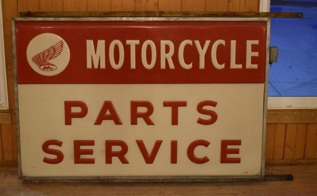 Early Logo Honda Motorcycles Parts & Service Lighted Dealership Sign (TAC): rate 9, 52" x 72", Double Sided Embossed Lighted Honda Sign, Both Sides in Good Condition, Reverse has a newer logo, almost like a transition era sign, very cool sign! TAC #046707