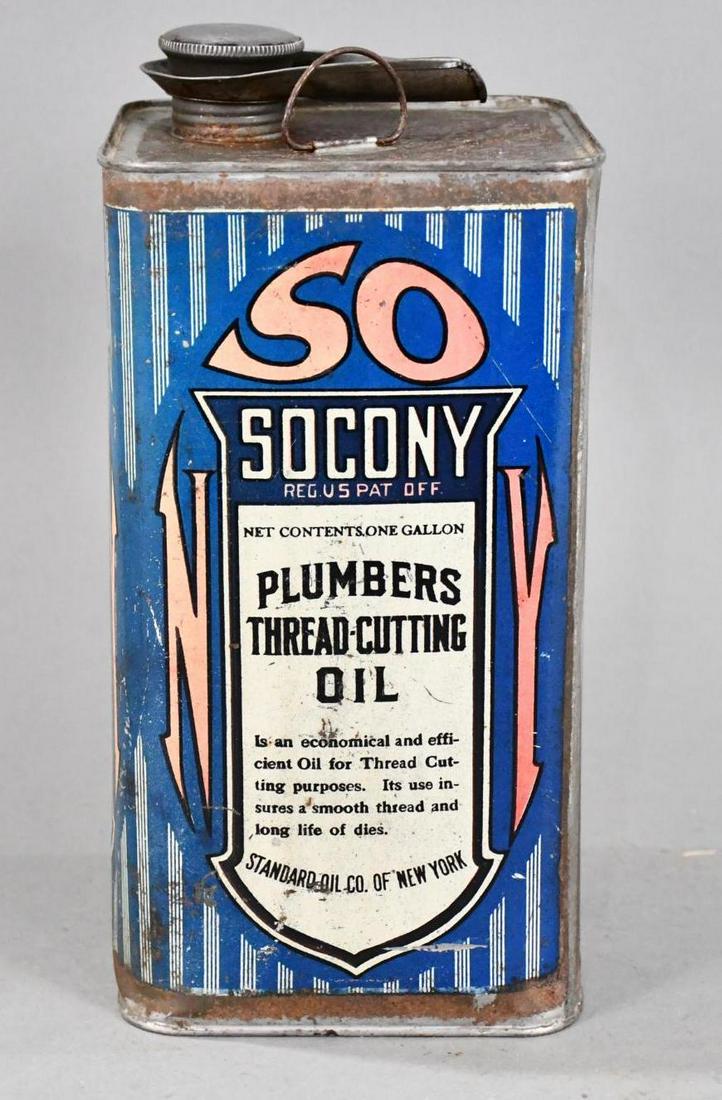 Socony Plumbers Thread Cutting Oil One Gallon Square Metal Can: rated 7.25, the one gallon square metal can has good color, has wear and fine scratches, is empty, has lid.
