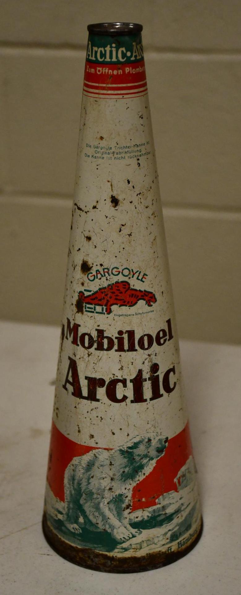 Mobiloel Arctic w/Polar Bear Motor Oil Metal Cone Can: rated 7.25, one liter metal can, has good color, has rust spots, minor dings, is full.
