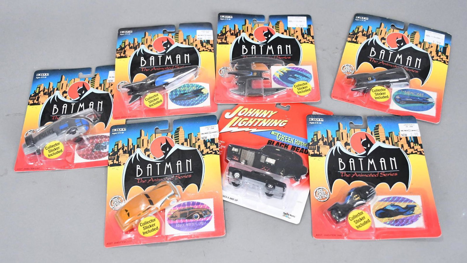 7-Ertl Batman "The Animated Series" 1/64 Scale Vehicles NIP: rated 9, 7.25"x6.25", all toys are new on the cards in good condition.