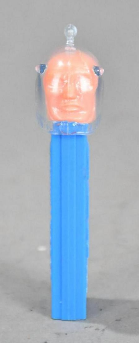 Pez Astronaut no feet Dispenser: rated 9.5, 4"T., the plastic dispenser is in very good condition.