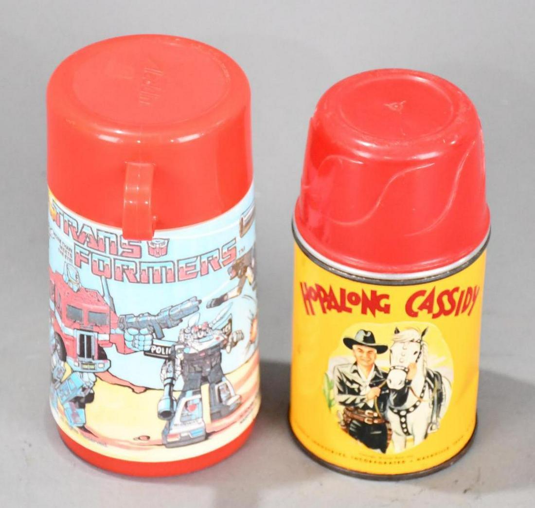 Hopalong & Transformer Thermos: rated 7, the Hopalong metal thermos has a dent and something is rattling inside, Transformer is plastic.